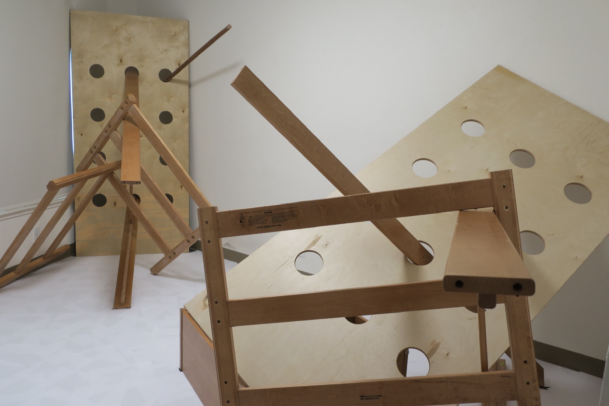 2: A Monument, 2023 — installation view, deconstructed bed frames leaning against each other