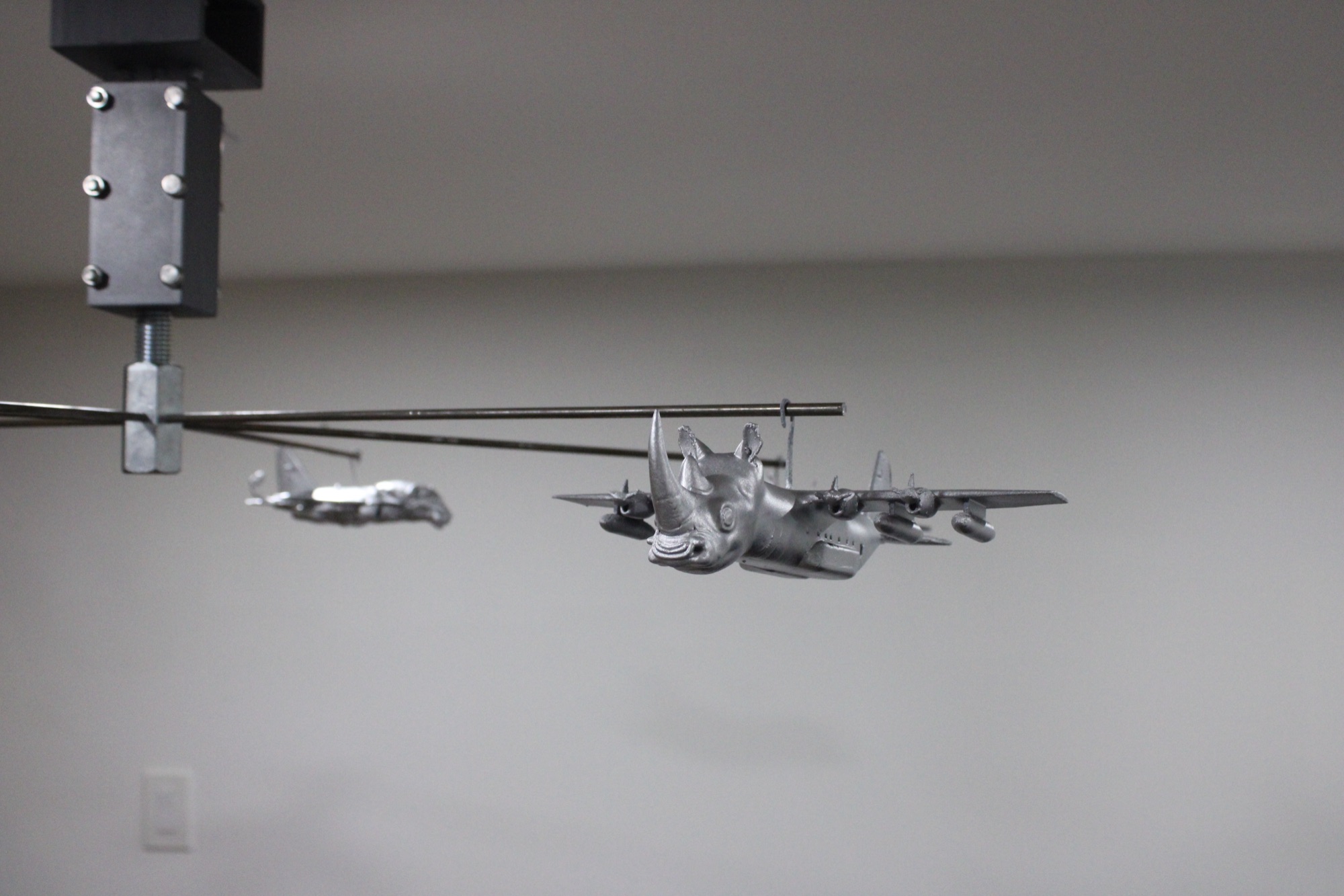 Mobilized, 2026 — detail view of an F-16/hawk hybrid form