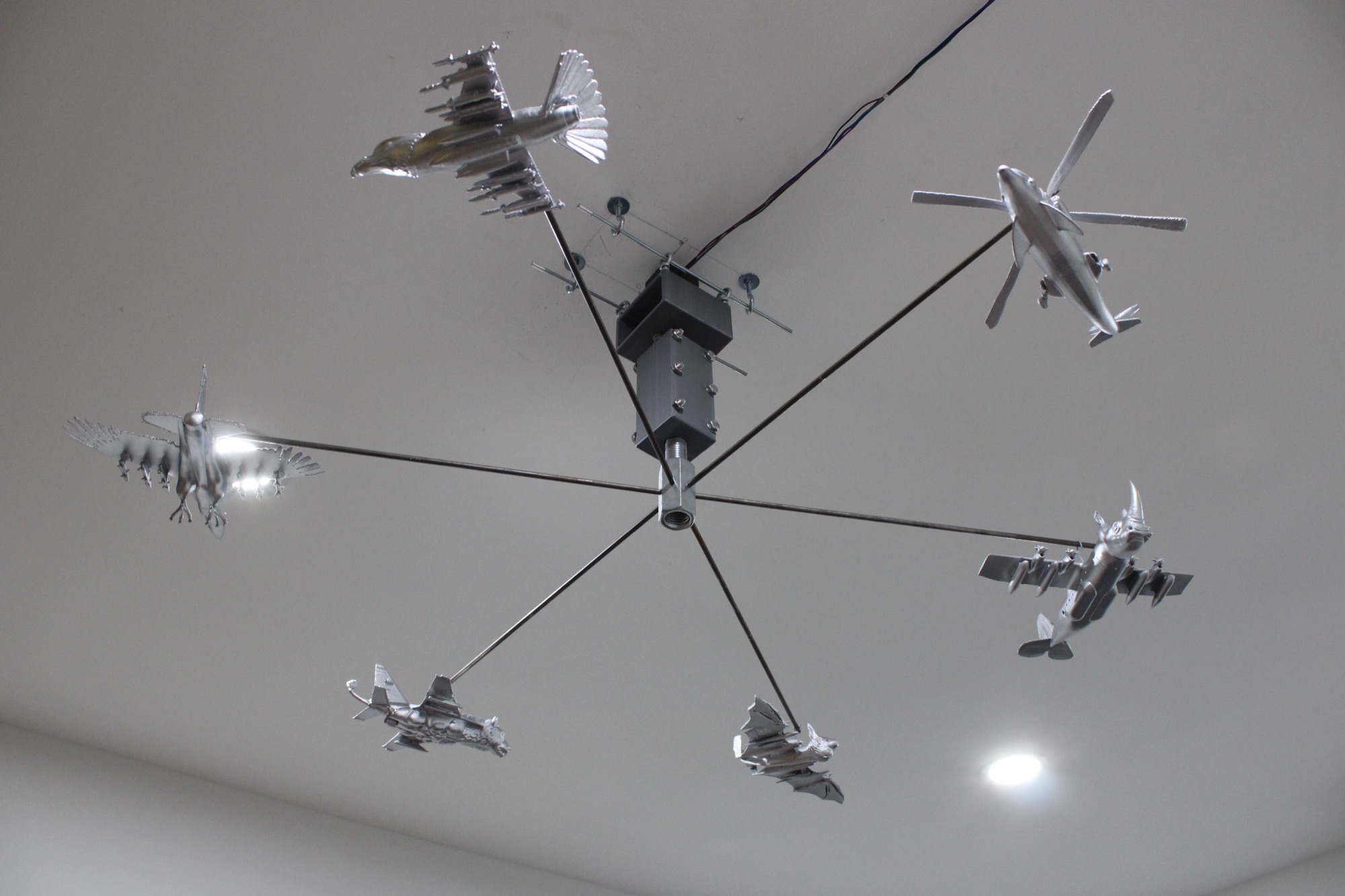 Mobilized, 2026 — detail view of a helicopter/dolphin hybrid form